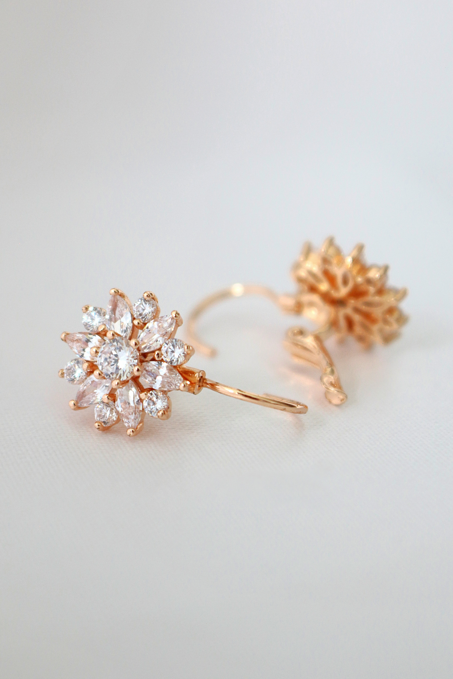 Sunflower Huggie Earrings Rose Gold & Cubic Zirconia - Blooms of joy for your ears.