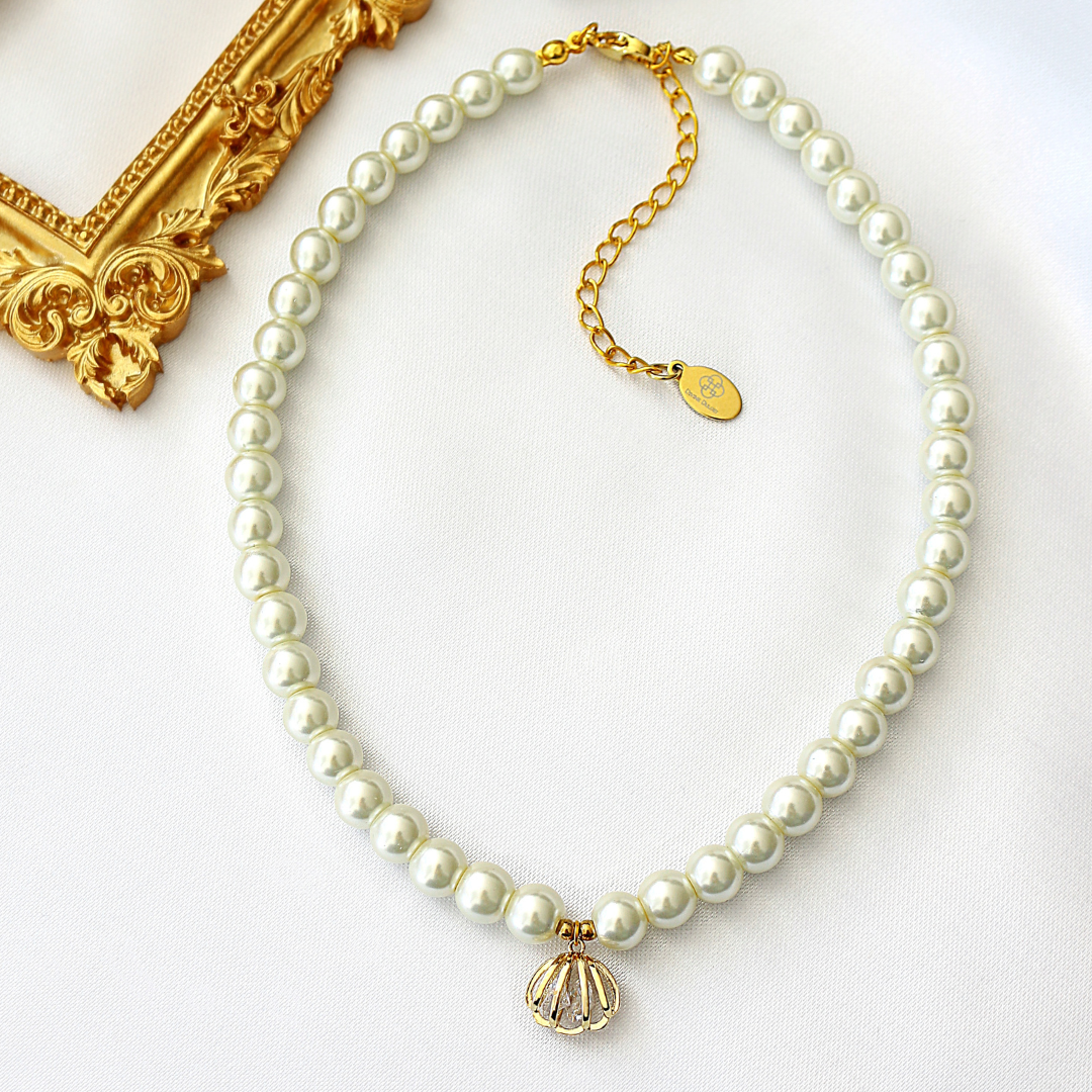 Czech Pearl Choker with Seashell Charm -  A touch of the sea, a spark of elegance.