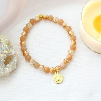 Sunstone Elastic Bracelet with Lotus Charm - Carry luck and light wherever you go