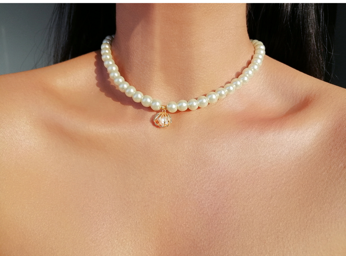 Czech Pearl Choker with Seashell Charm -  A touch of the sea, a spark of elegance.
